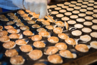 Eating poffertje in the Netherlands